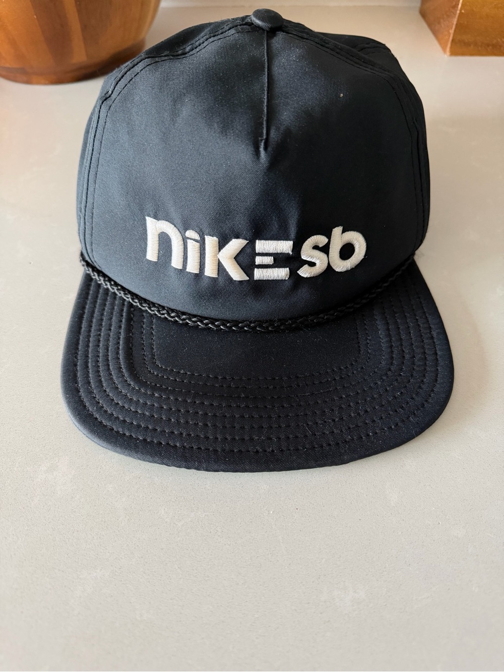Nike SB Black Snapback Hat with White Logo